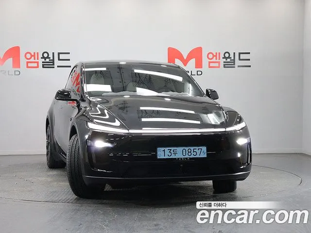 Tesla Model Y — Фото автомобиля 2