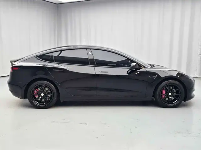 Tesla Model 3 — Фото автомобиля 7