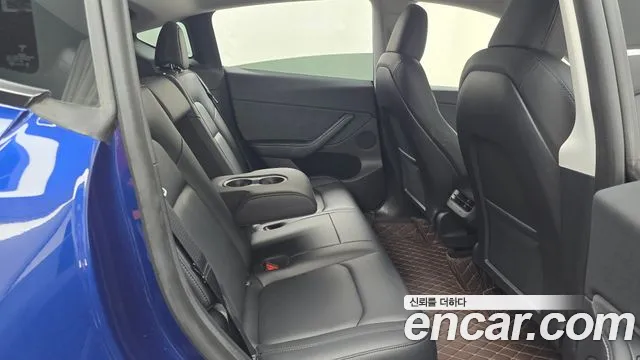Tesla Model Y — Фото автомобиля 9