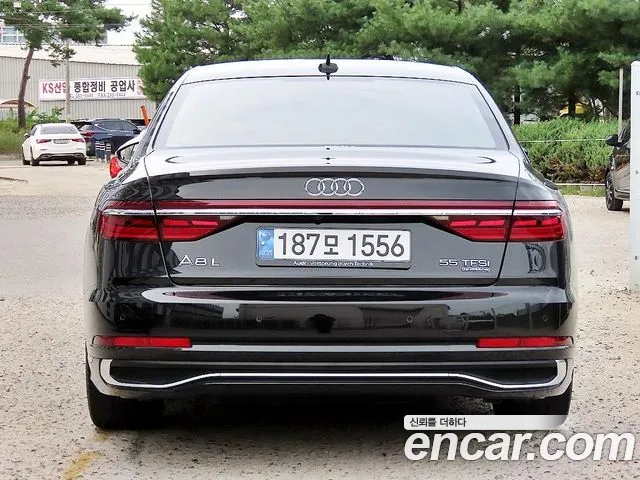 Audi A8 55 TFSI quattro Premium LWB — Фото автомобиля 4