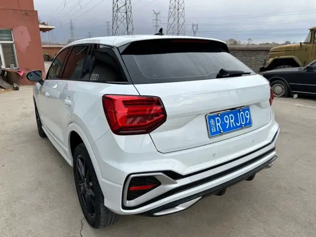 Audi Q2L — Фото автомобиля 6