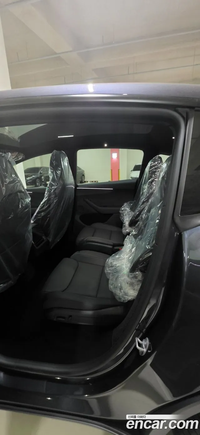 Tesla Model Y — Фото автомобиля 16