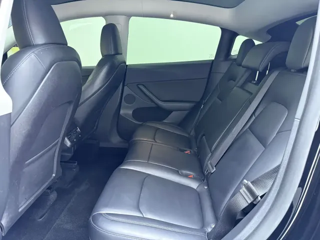 Tesla Model Y — Фото автомобиля 13