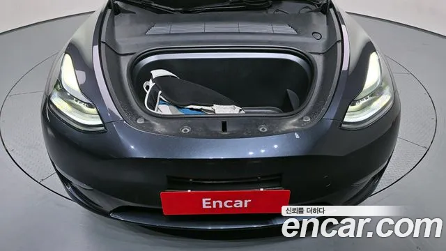 Tesla Model Y — Фото автомобиля 6