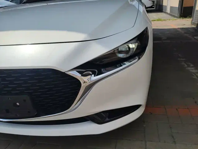 Mazda Axela — Фото автомобиля 23
