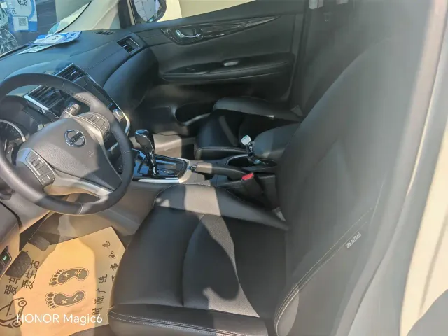 Nissan Tiida — Фото автомобиля 16