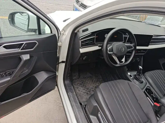 Volkswagen Tiguan L — Фото автомобиля 15