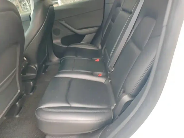 Tesla Model Y — Фото автомобиля 16