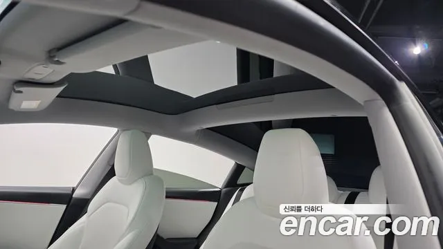 Tesla Model 3 — Фото автомобиля 25