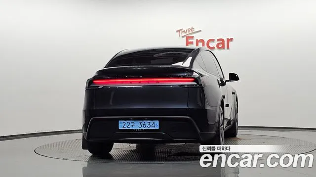 Tesla Model Y — Фото автомобиля 4