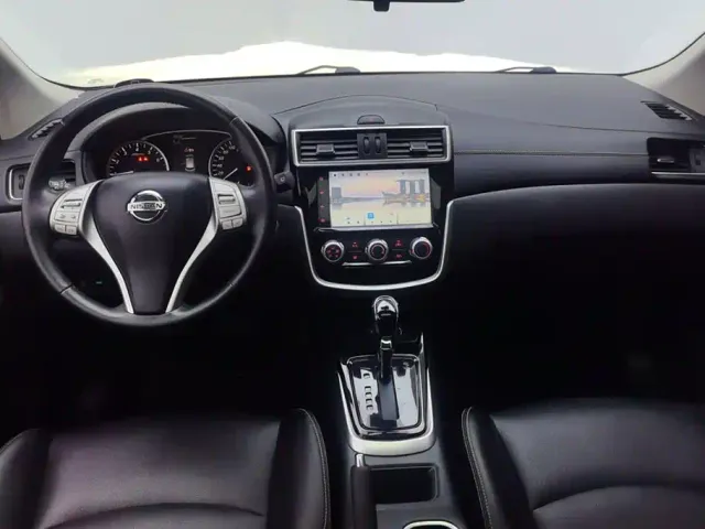 Nissan Tiida — Фото автомобиля 12