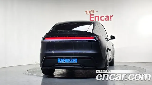 Tesla Model Y — Фото автомобиля 4