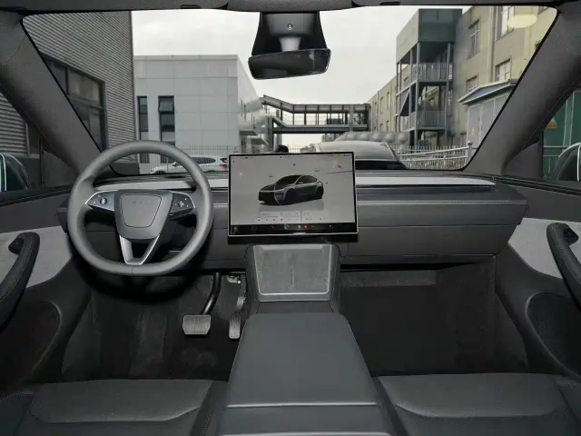 Tesla Model Y — Фото автомобиля 5