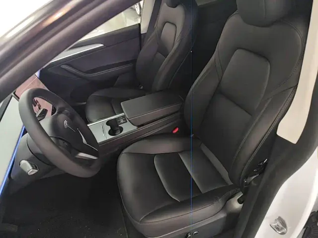 Tesla Model Y — Фото автомобиля 14