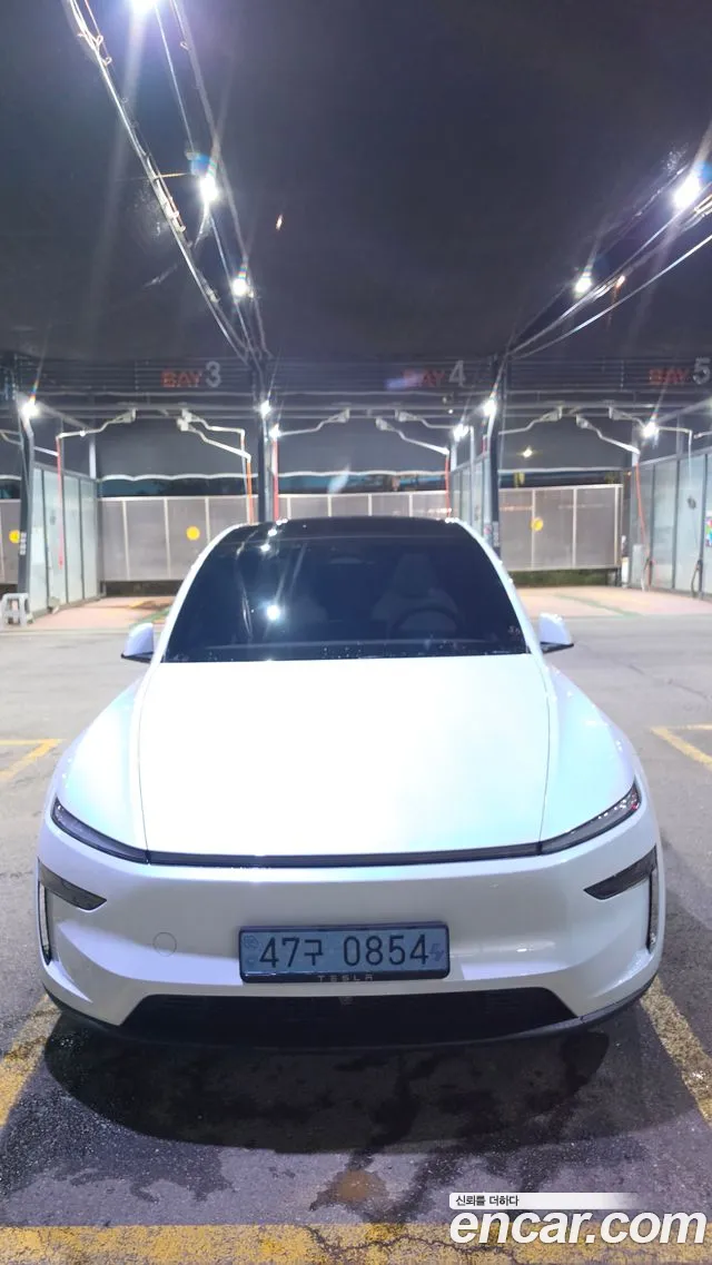 Tesla Model Y — Фото автомобиля 10