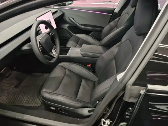 Tesla Model 3 — Фото автомобиля 14