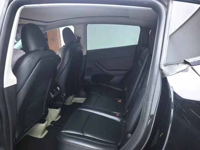 Tesla Model Y — Фото автомобиля 5