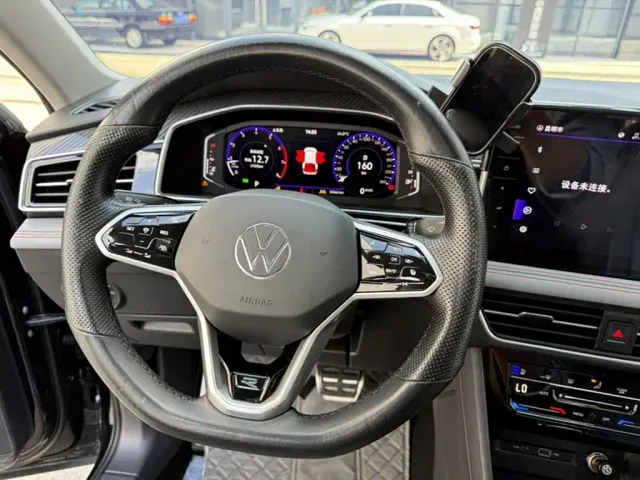 Volkswagen Tiguan L — Фото автомобиля 7