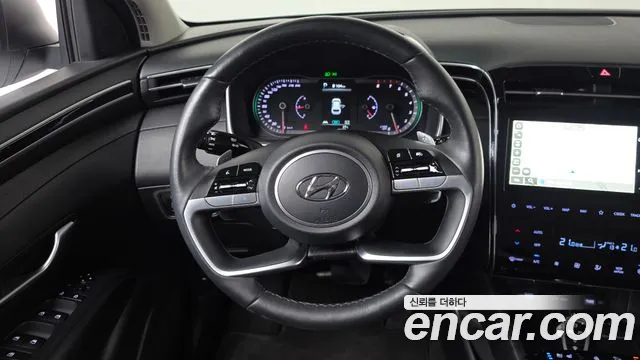 Hyundai Tucson Tucson (NX4) Бензин 1.6 Turbo 4WD — Фото автомобиля 12