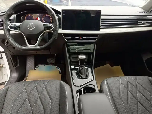 Volkswagen Tiguan L — Фото автомобиля 5
