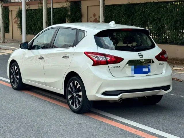 Nissan Tiida — Фото автомобиля 8