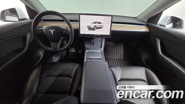 Tesla Model Y — Фото автомобиля 10