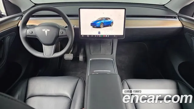 Tesla Model Y — Фото автомобиля 10