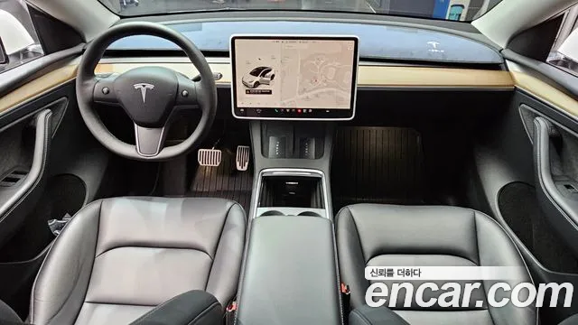 Tesla Model Y — Фото автомобиля 10