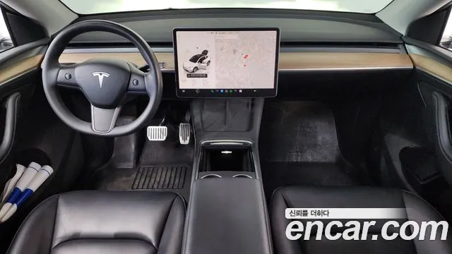 Tesla Model Y — Фото автомобиля 10