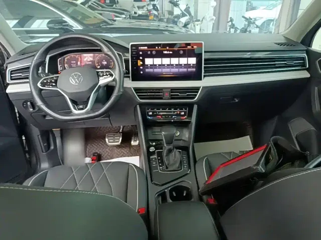 Volkswagen Tiguan L — Фото автомобиля 9