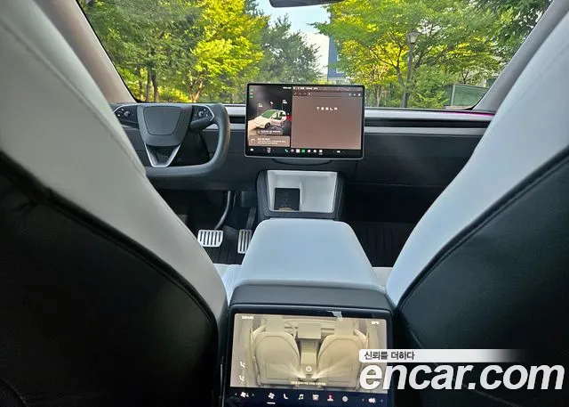 Tesla Model Y — Фото автомобиля 13