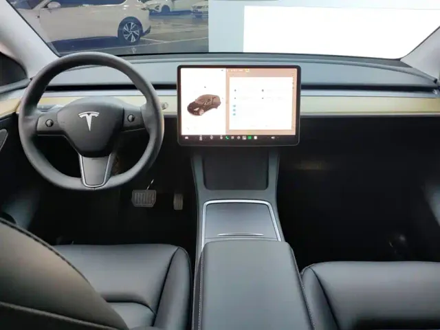 Tesla Model Y — Фото автомобиля 12