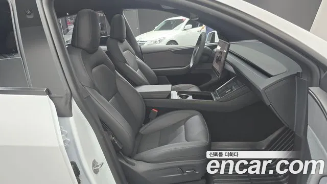 Tesla Model Y — Фото автомобиля 17