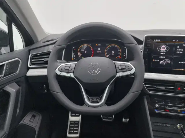 Volkswagen Tiguan L — Фото автомобиля 11