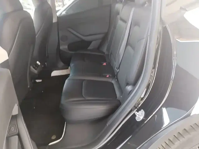 Tesla Model Y — Фото автомобиля 16