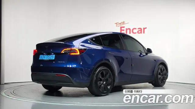 Tesla Model Y — Фото автомобиля 2