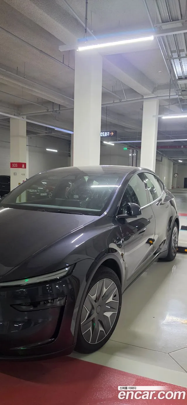 Tesla Model Y — Фото автомобиля 5