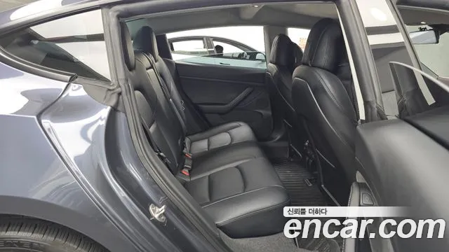 Tesla Model 3 — Фото автомобиля 11