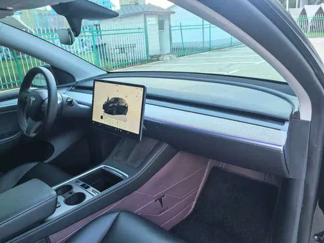 Tesla Model Y — Фото автомобиля 14