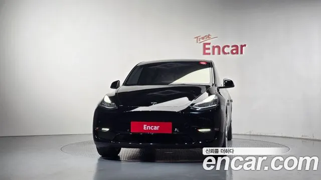 Tesla Model Y — Фото автомобиля 3