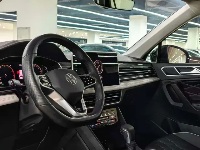 Volkswagen Tiguan L — Фото автомобиля 7