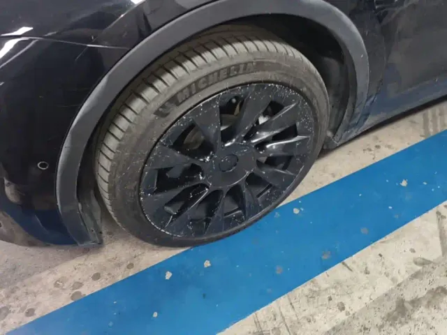 Tesla Model Y — Фото автомобиля 22