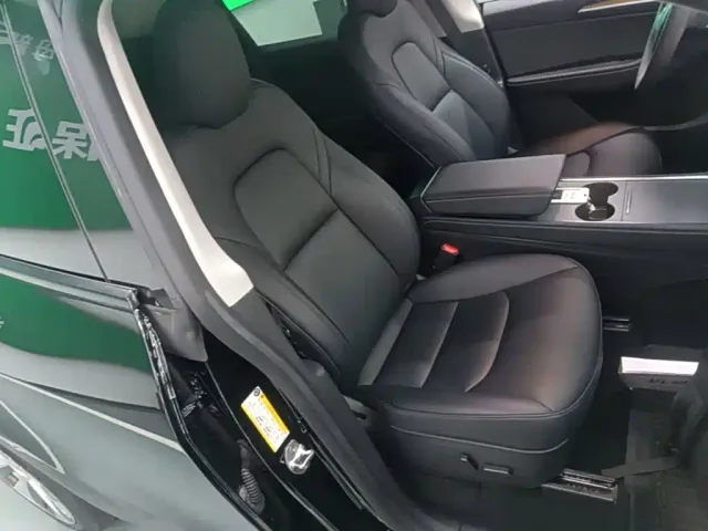 Tesla Model Y — Фото автомобиля 24