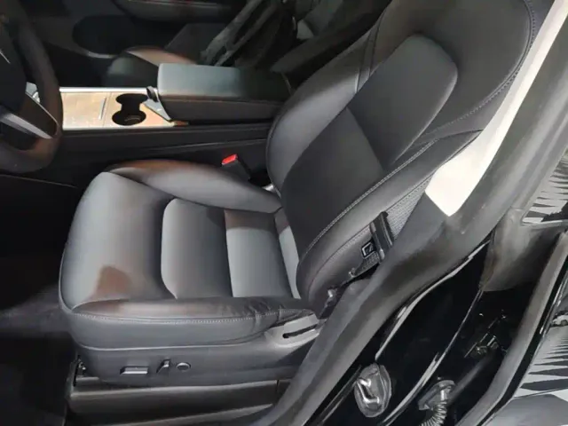 Tesla Model Y — Фото автомобиля 14