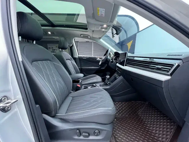 Volkswagen Tiguan L — Фото автомобиля 13