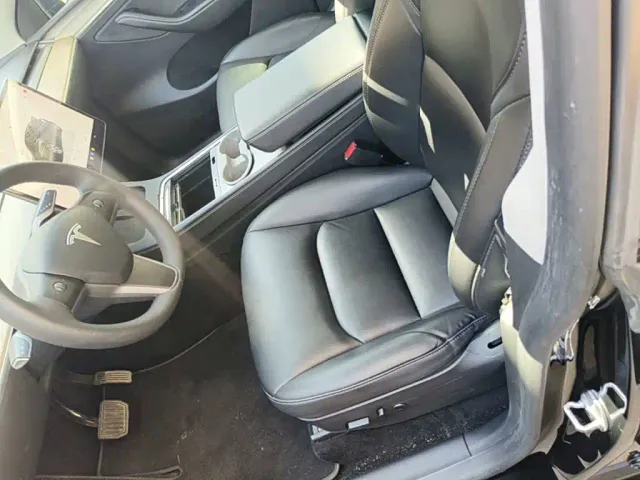 Tesla Model Y — Фото автомобиля 14