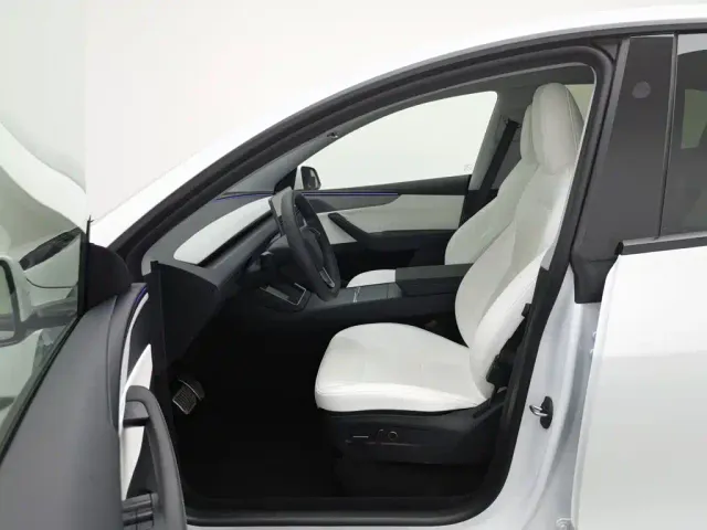 Tesla Model Y — Фото автомобиля 10
