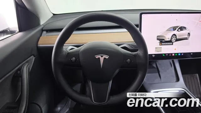 Tesla Model Y — Фото автомобиля 15