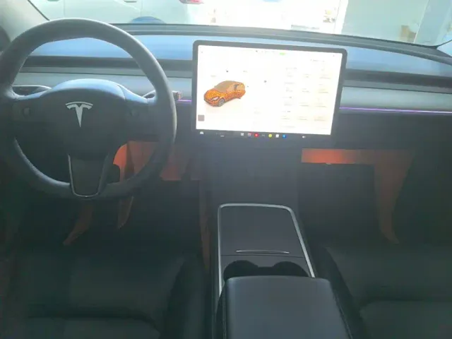Tesla Model Y — Фото автомобиля 9