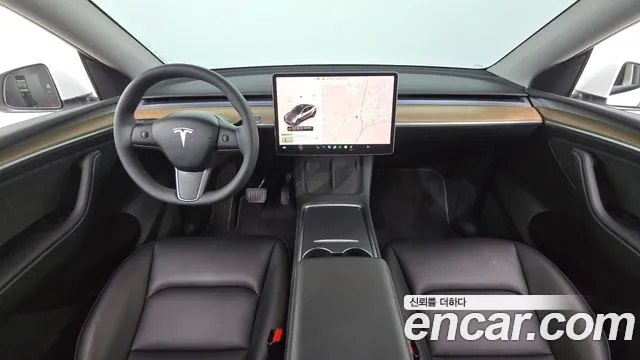 Tesla Model Y — Фото автомобиля 7